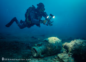 Mariusz photographs ancient amphorae near the islet of Host, Vis, Croatia. Underwater Archaeology and Underwater Photogrammetry. Underwater Heritage